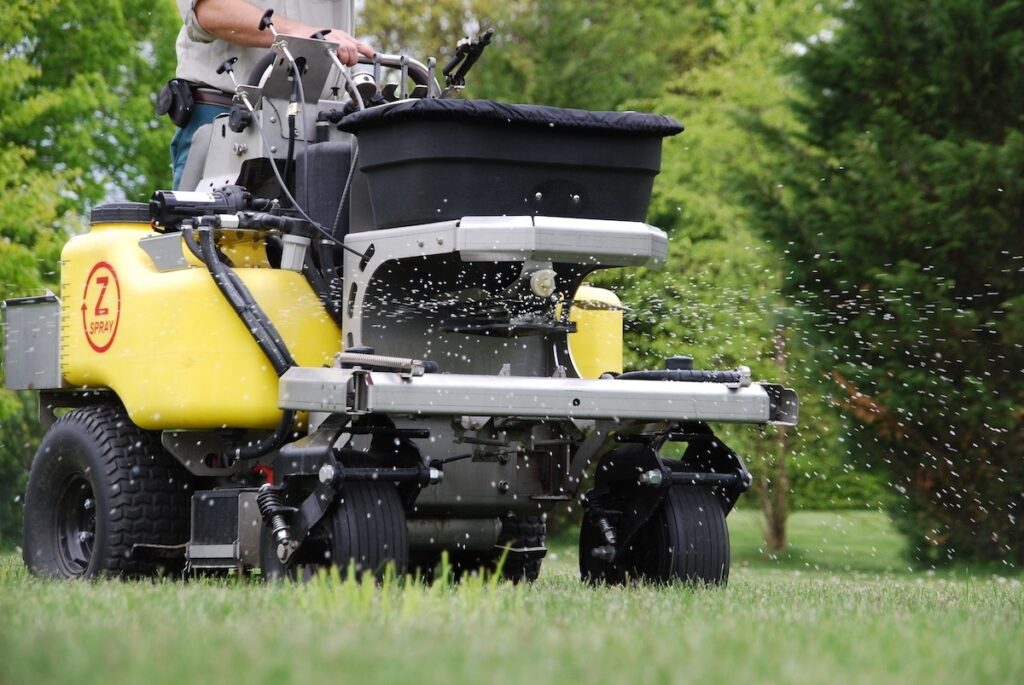 The Benefits of Regular Aeration and Overseeding for Commercial Lawns